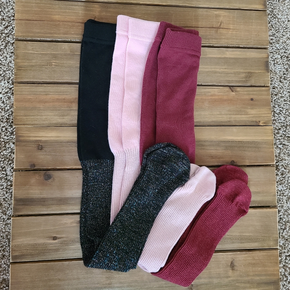 3 Marks & Spencers Sparkle tights 4 to 5 years size. Black, maroon and pink.